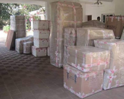 In this image you see can see some packings in a home, That packed by the Express Cargo Packers and Movers in Delhi. Our company is relocation services provider.